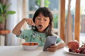 Girl eating cereal