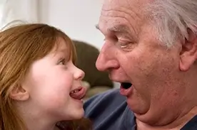 Grandfather & Grandaughter Playing